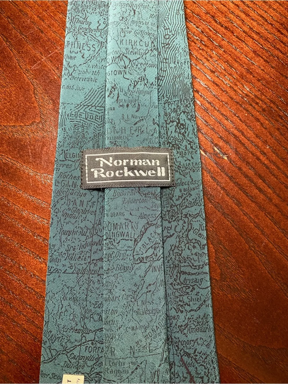 Norman Rockwell Christmas Neck Tie. Santa on ladder looking at Christmas lists